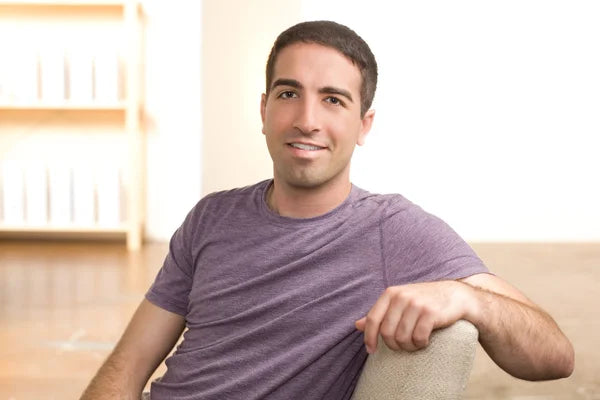 files/depositphotos_11745653-stock-photo-cute-guy-leaning-on-chair.webp
